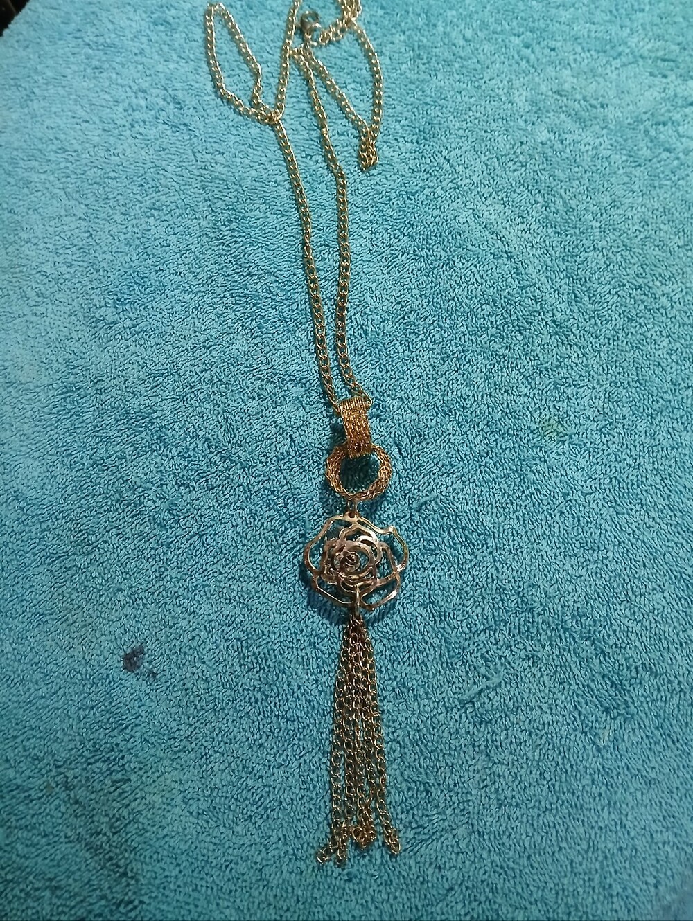 Open Work Floral Goldtone Long Chain Necklace With Crystals Inside Flower